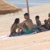 Bañistas en la playa de Orellana