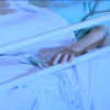 Paciente Covid en una cama de hospital