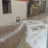 Calle de Guijo de Galisteo anegada por el agua