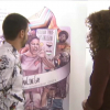 El director de 'Sedimentos', Adrián Silvestre, y la actriz cacereña, Saya Solanas, frente al cartel de FanCineGay