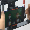 Alumnos con un movil