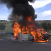 Coche calcinado en la A66