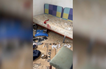 Imagen de habitación llena de basura